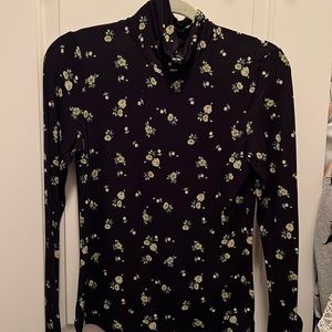 Black long sleeve painted floral print turtleneck